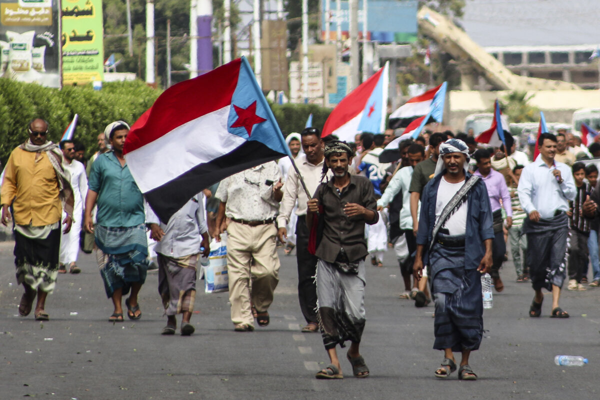 Supporters of the Southern Transitional Council (STC), a coalition of separatist groups seeking to restore the state of South Yemen, wave South Yemen flags during a demonstration calling for the revival of the former independent state, in Aden, Yemen, on Dec. 12, 2025. (Saleh Al-Obeidi/AFP via Getty Images)