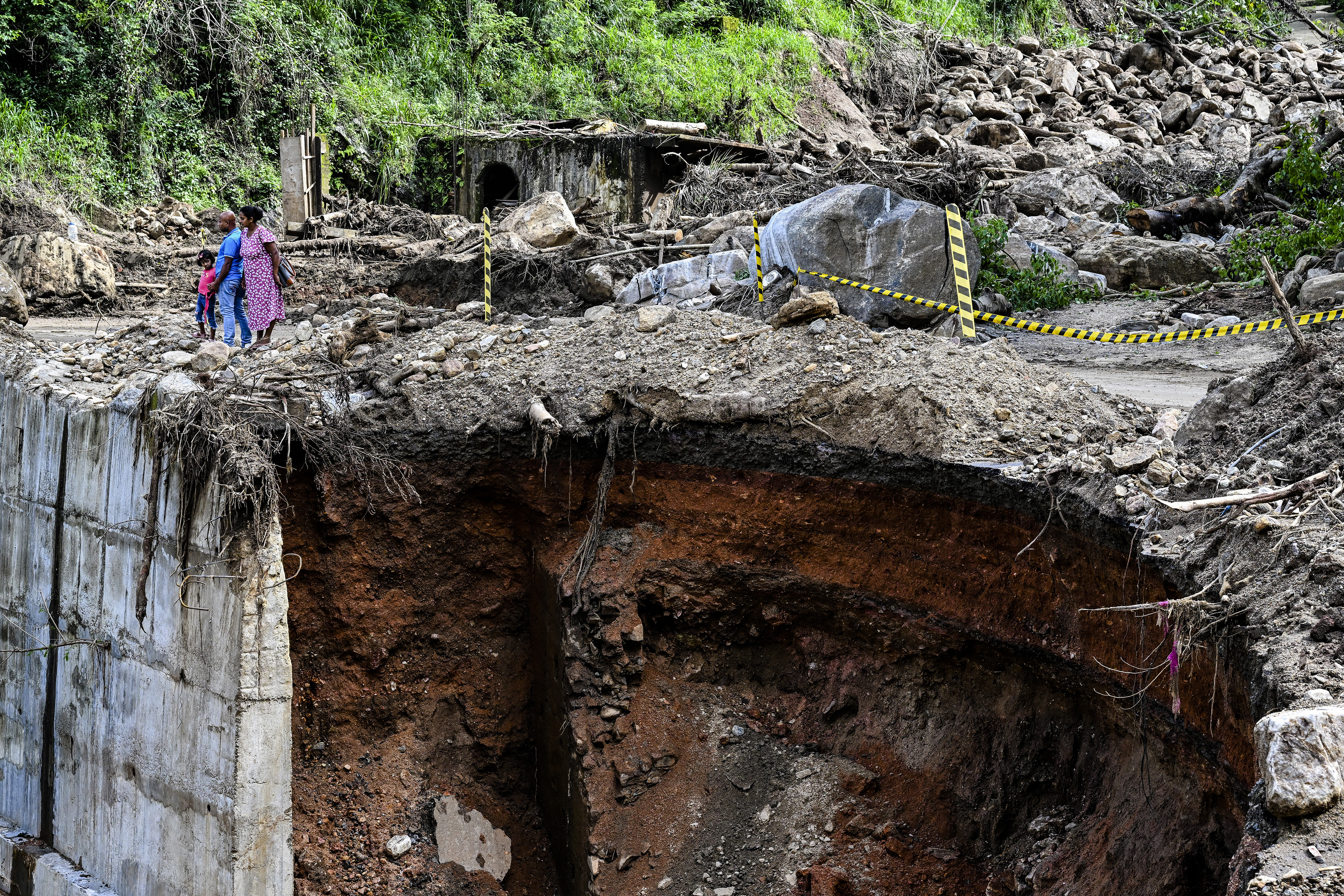 Day in Photos: Eruption of Mount Semeru, Winter Fiesta, and Scuba-Diving Santa Claus