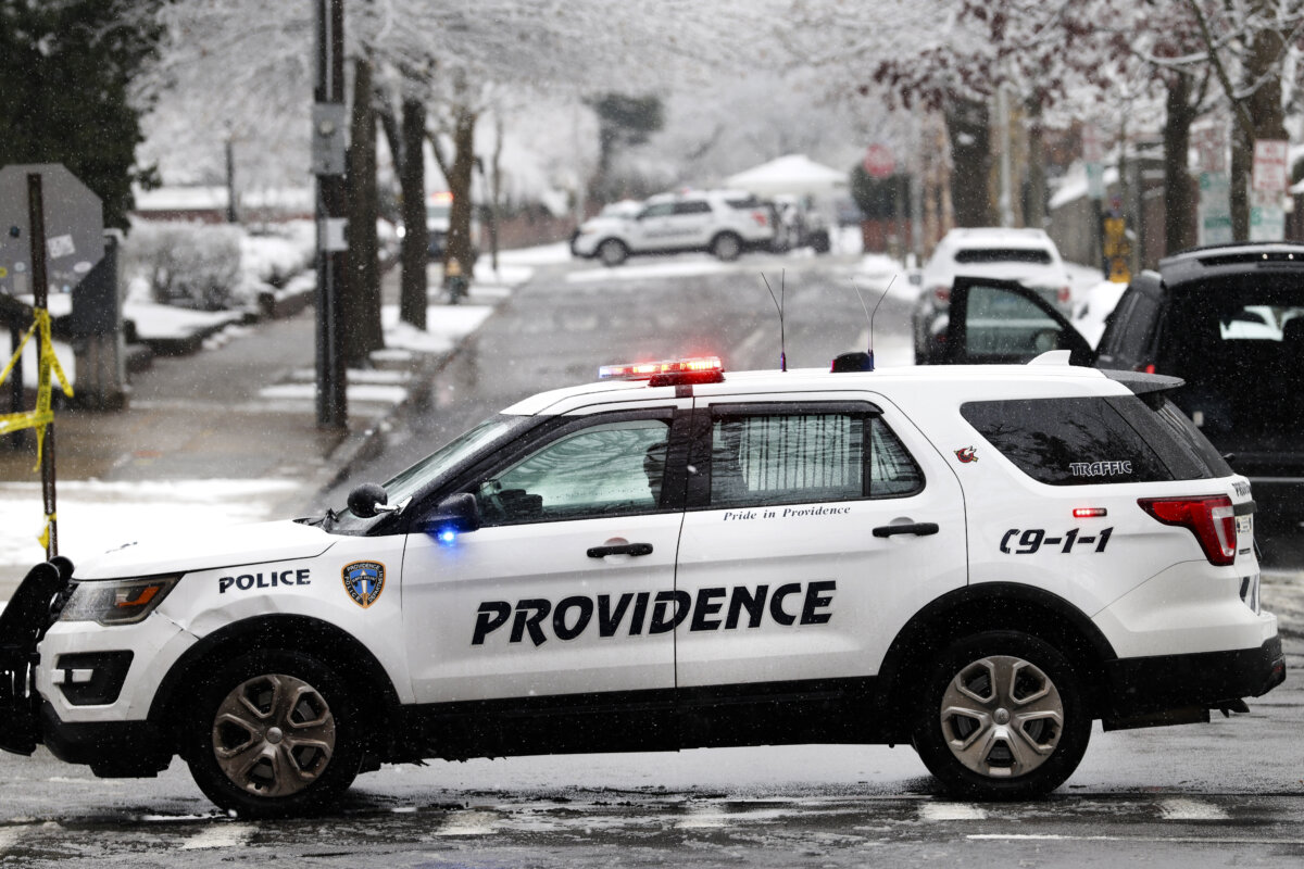 Police patrol Brown University following a mass shooting that left at least two people dead and nine others injured, in Providence, R.I., on Dec. 14, 2025. (Spencer Platt/Getty Images)