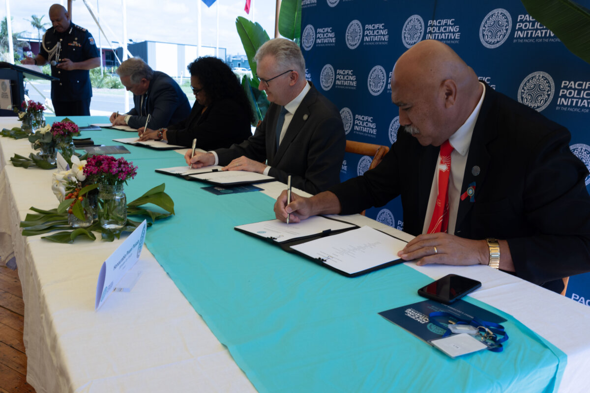 Home Affairs Minister Tony Burke (C) signs an updated policing agreement with representatives of Pacific Island nations on Dec. 4, 2025. (Courtesy of the Australian Federal Police)