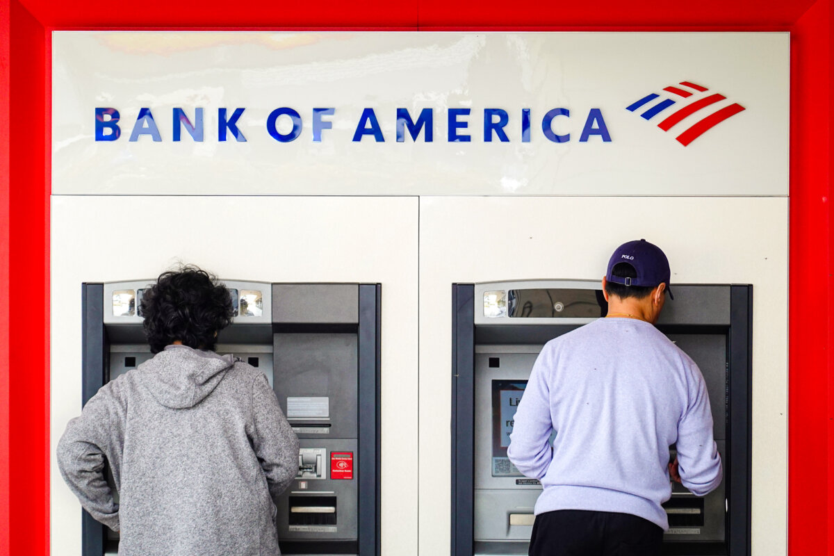 Customers use ATMs at a Bank of America office in Daly City, Calif., on July 18, 2023. (Justin Sullivan/Getty Images)