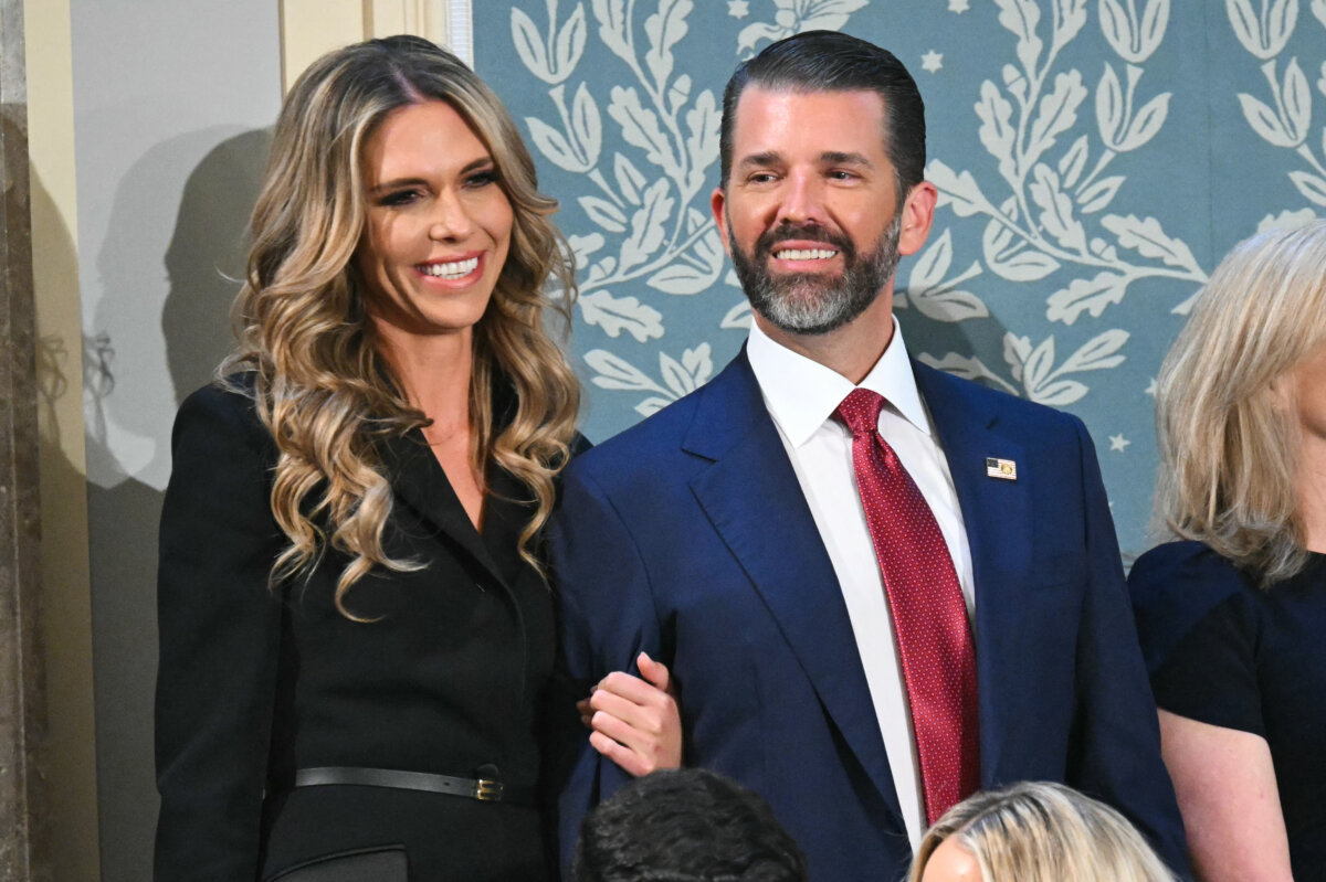 Donald Trump Jr. (R) arrives with Bettina Anderson ahead of President Donald Trump's address to a joint session of Congress in the House Chamber of the U.S. Capitol in Washington on March 4, 2025. (Saul Loeb/AFP via Getty Images)