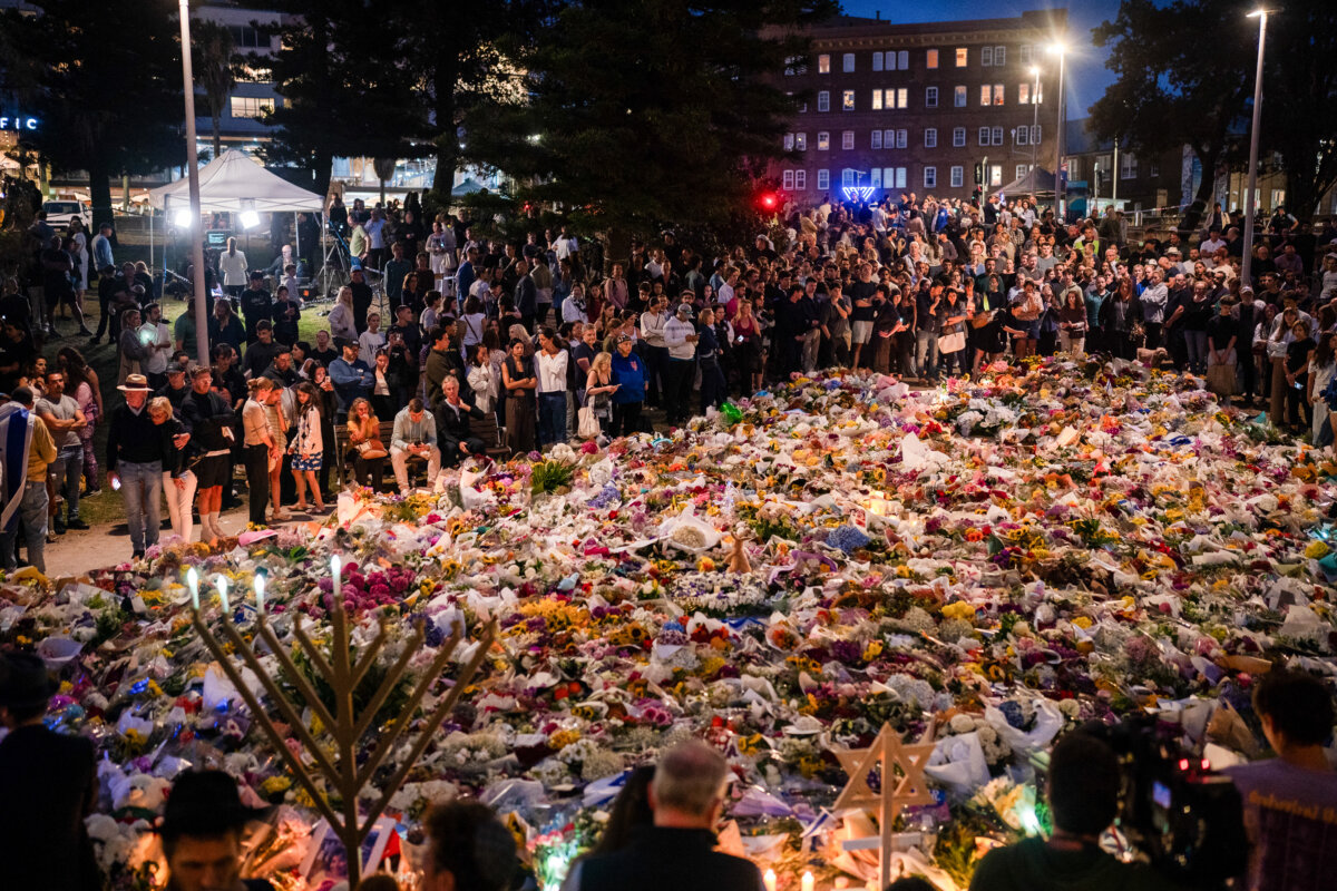 Floral tributes and candles are placed at at Bondi Pavilion at Bondi Beach in Sydney, Australia on Dec. 16, 2025. (Audrey Richardson/Getty Images)