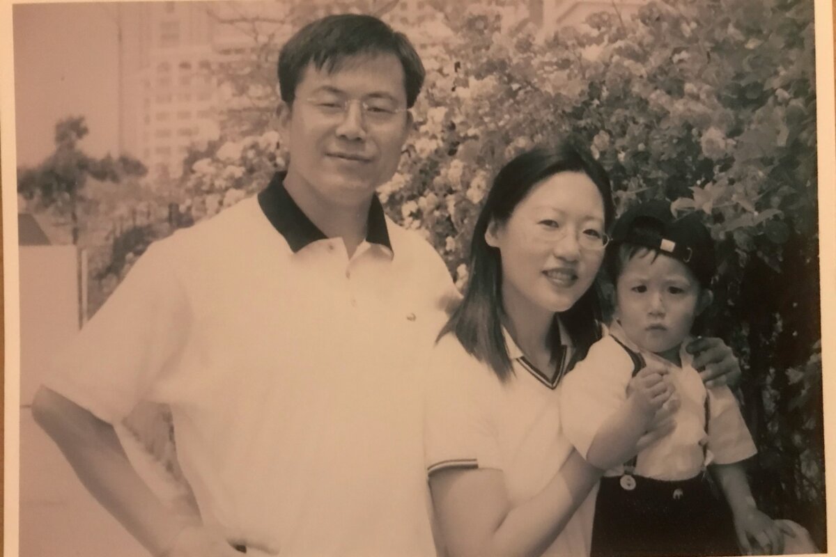 Zhang Wanxia (C) with her son and husband in China in the summer of 2003. (Courtesy of Zhang Wanxia)