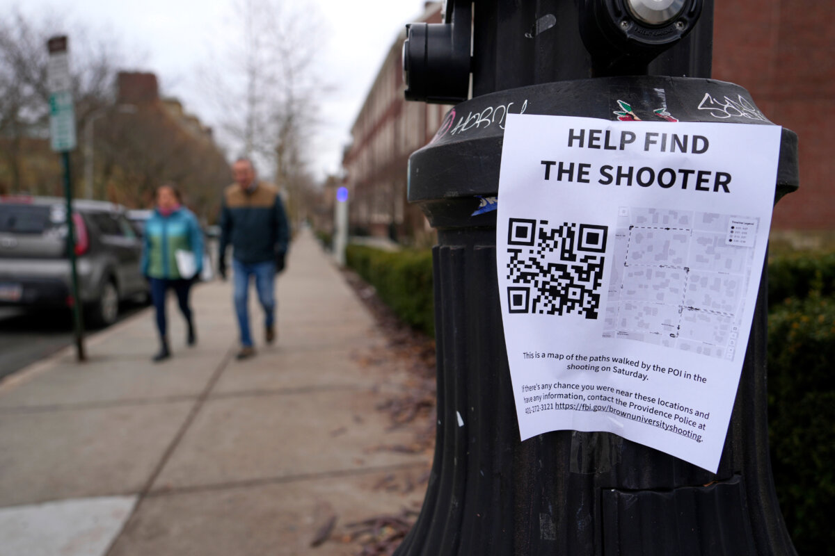 A poster seeking information about the campus shooting suspect is seen on the campus of Brown University in Providence, R.I., on Dec. 17, 2025. (Robert F. Bukaty/AP Photo)