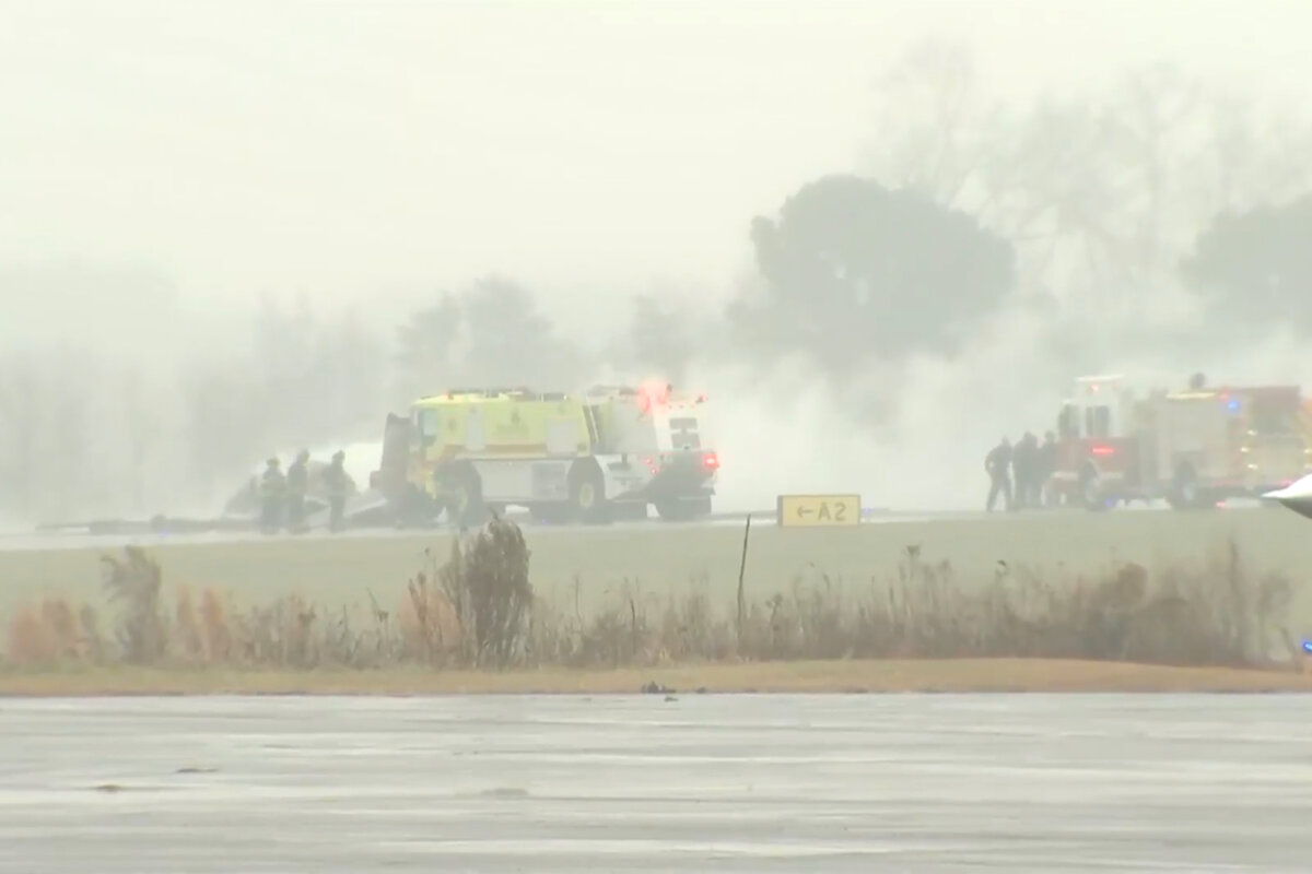 Firefighting crews respond to a reported plane crash at a regional airport in Statesville, N.C., on Dec. 18, 2025, in a still from video. (WSOC via AP)