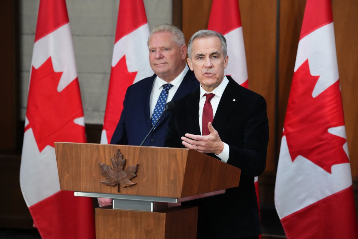 Prime Minister Mark Carney and Ontario Premier Doug Ford hold a press conference in Ottawa on Dec. 18, 2025. (The Canadian Press/Sean Kilpatrick)