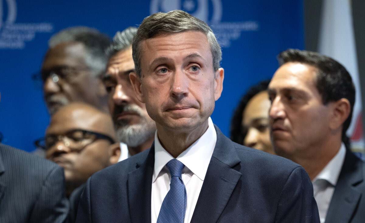 Ken Martin, chairman of the Democratic National Committee, listens to speakers during a press conference in Aurora, Ill., on Aug. 5, 2025. (Scott Olson/Getty Images)
