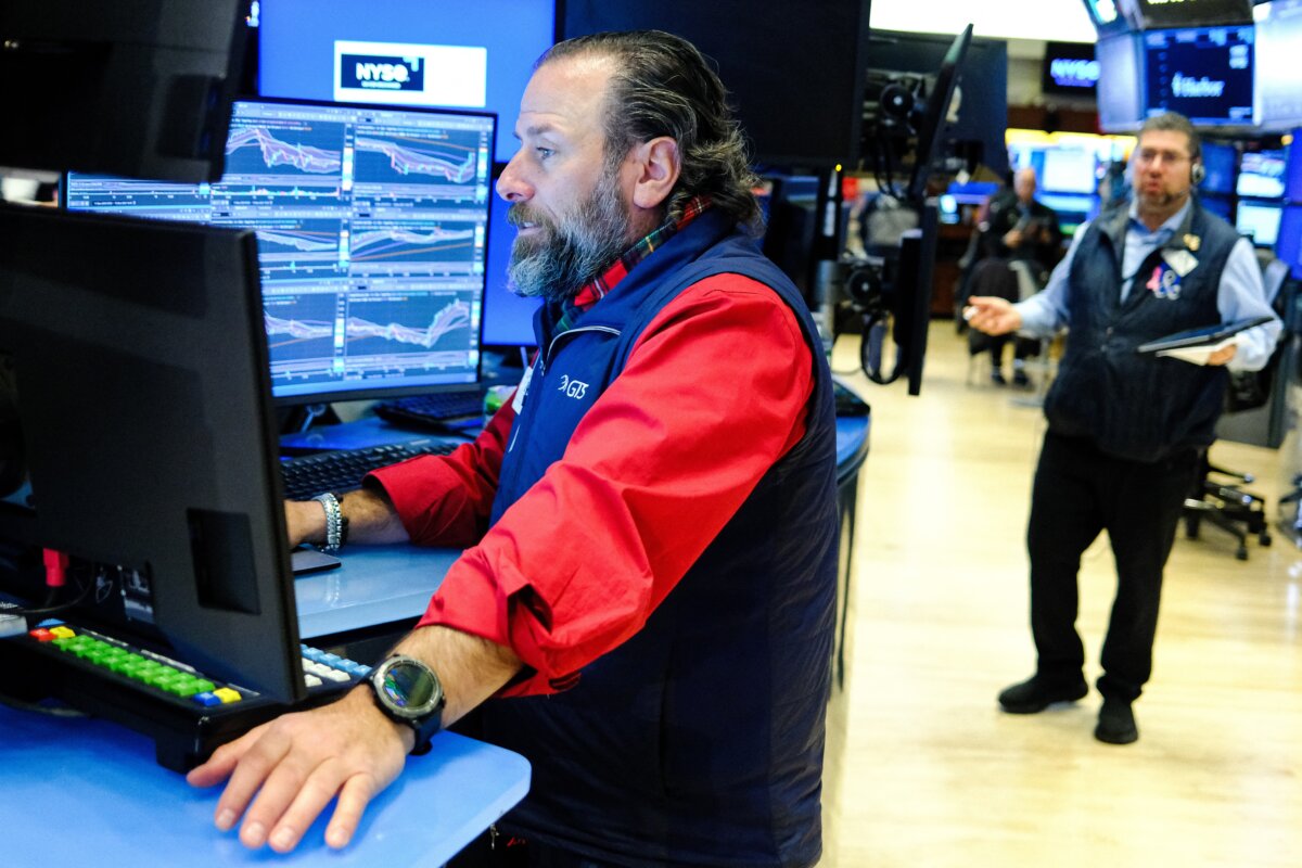 Traders work on the floor of the New York Stock Exchange on Dec. 16, 2025. (Charly Triballeau/AFP via Getty Images)