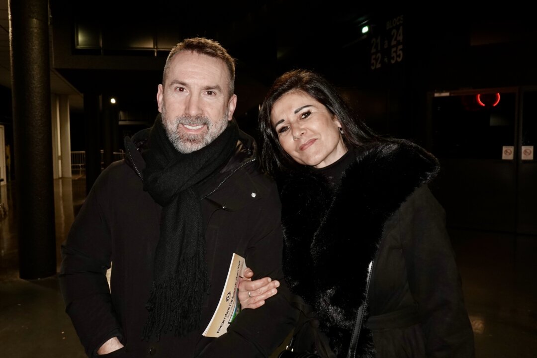 Laurent Romo (L) and Catherine Lhonneur enjoyed Shen Yun's evening performance at Galaxie Amnéville, in France, on Dec. 20, 2025. (Fan Yi/The Epoch Times)