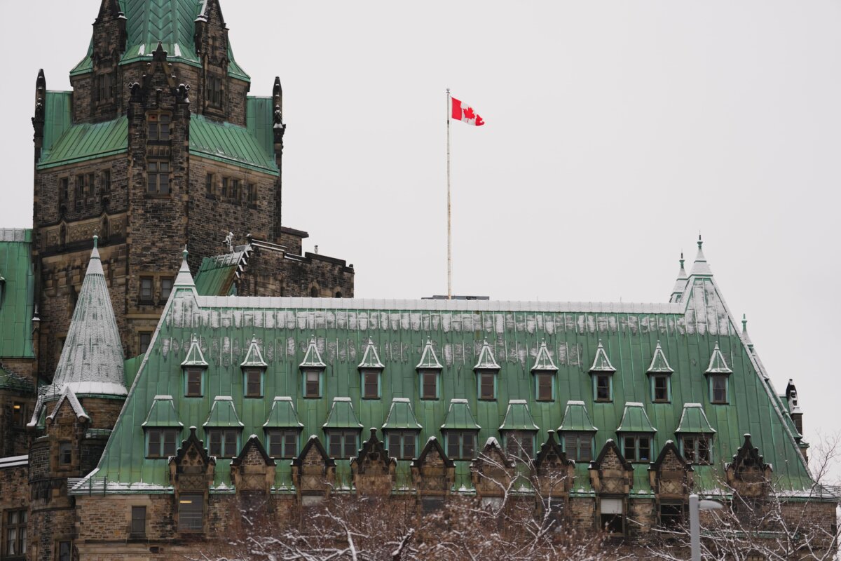 The snow-covered Confederation building is seen in Ottawa on March 10, 2025. (The Canadian Press/Sean Kilpatrick)