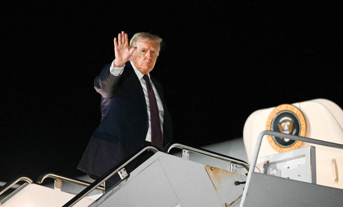 President Donald Trump boards Air Force One as he departs from Rocky Mount Wilson Regional Airport after holding a political rally, in Elm City, N.C., on Dec. 19, 2025. (Andrew Caballero-Reynolds/AFP via Getty Images)
