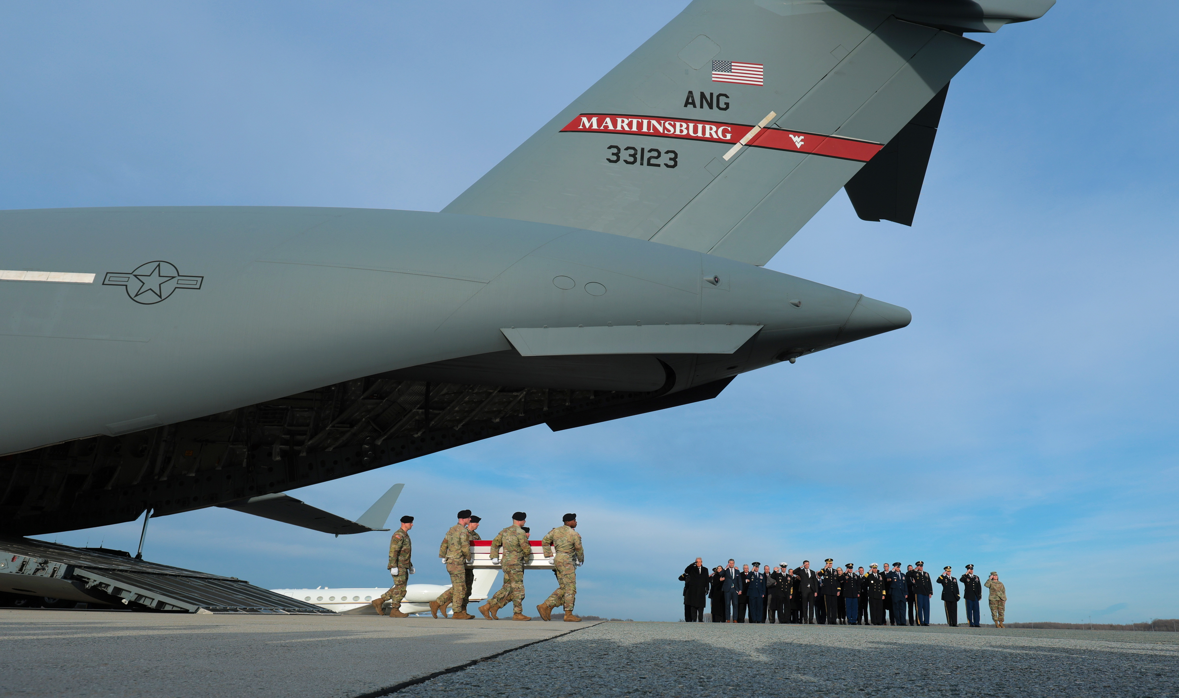 America in Photos: National Guard Dignified Transfer, Washington State Flood, and AmericaFest