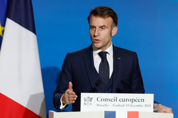 French President Emmanuel Macron speaks during a media conference at the European Union Summit in Brussels, Belgium, on Dec. 19, 2025. (Geert Vanden Wijngaert/AP Photo)