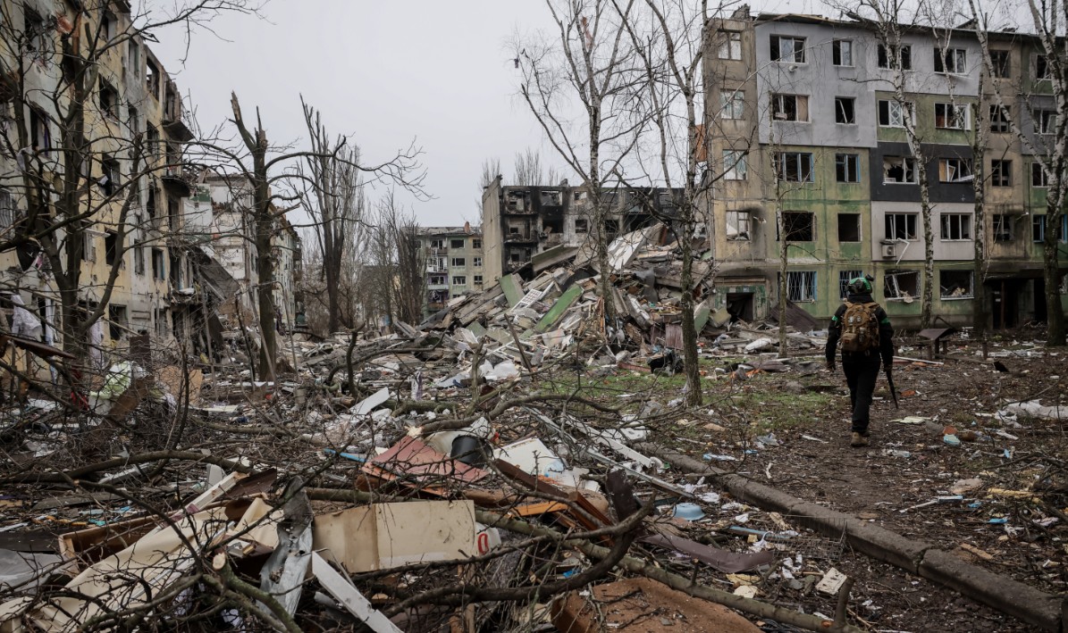 A soldier walks through the ruins of the town of Kostyantynivka, in the Donetsk region of Ukraine, on Dec. 20, 2025. (Oleg Petrasiuk/Ukraine's 24th Mechanized Brigade via AP)