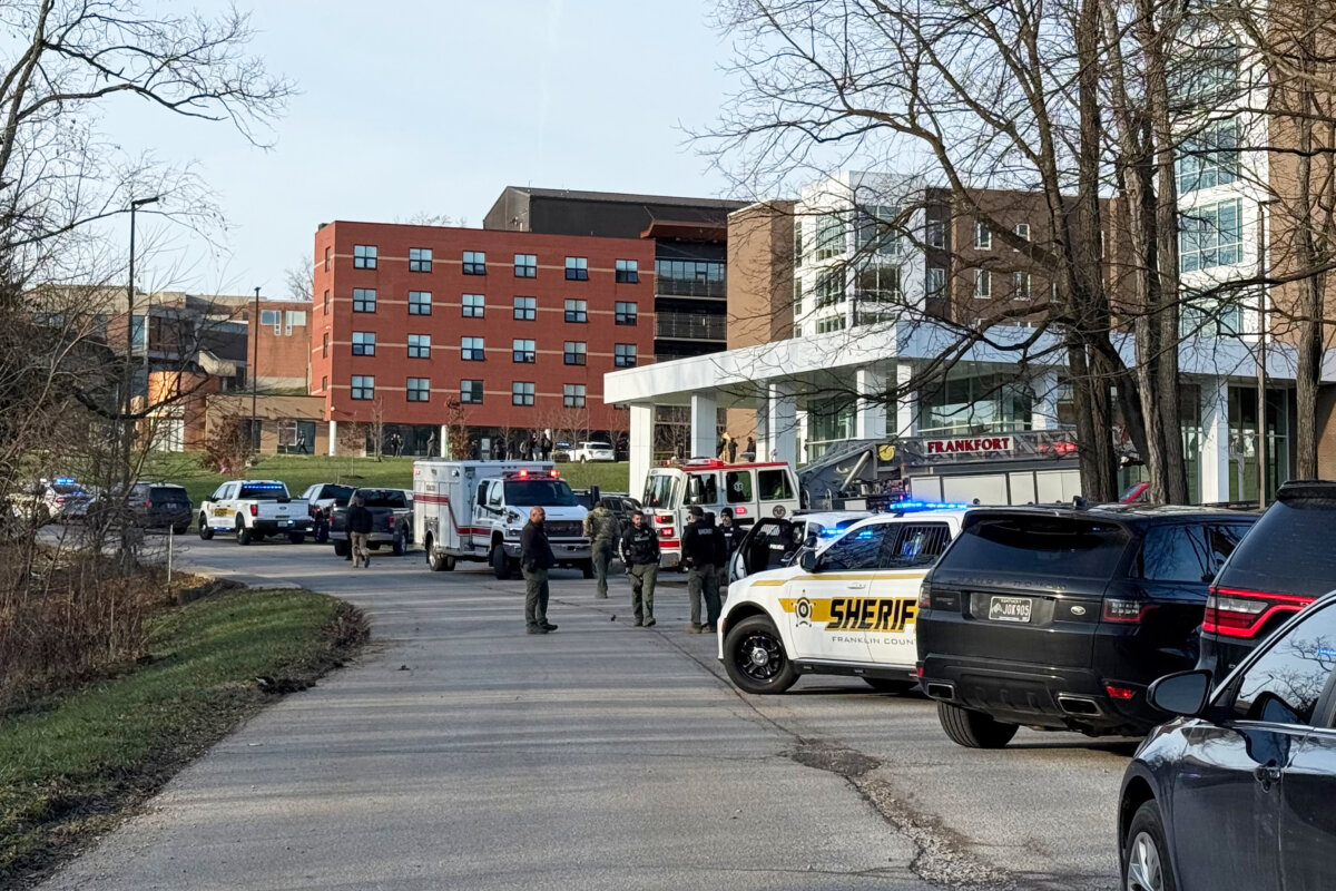 Law enforcement responds to a shooting at Whitney Moore Young Jr. Hall on Kentucky State University's campus in Frankfort, Ky., on Dec. 9, 2025. (Hannah Brown/The State Journal via AP)