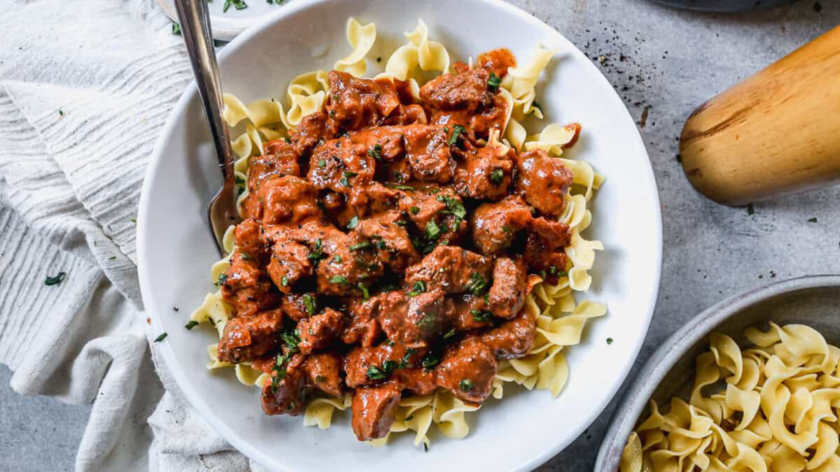 Hungarian Pörkölt is a classic pork stew in a rich and flavorful paprika sauce. It's made in one pot and served over noodles or mashed potatoes. (Lauren Allen)
