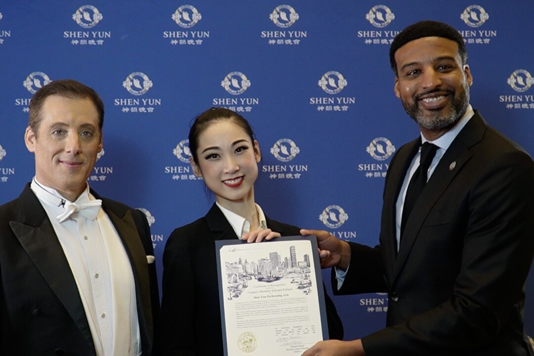 Houston Council Member Edward Pollard presented Shen Yun Performing Arts with a Certificate of Recognition at the Jones Hall for the Performing Arts in Houston, on Dec. 26, 2025. (NTD)