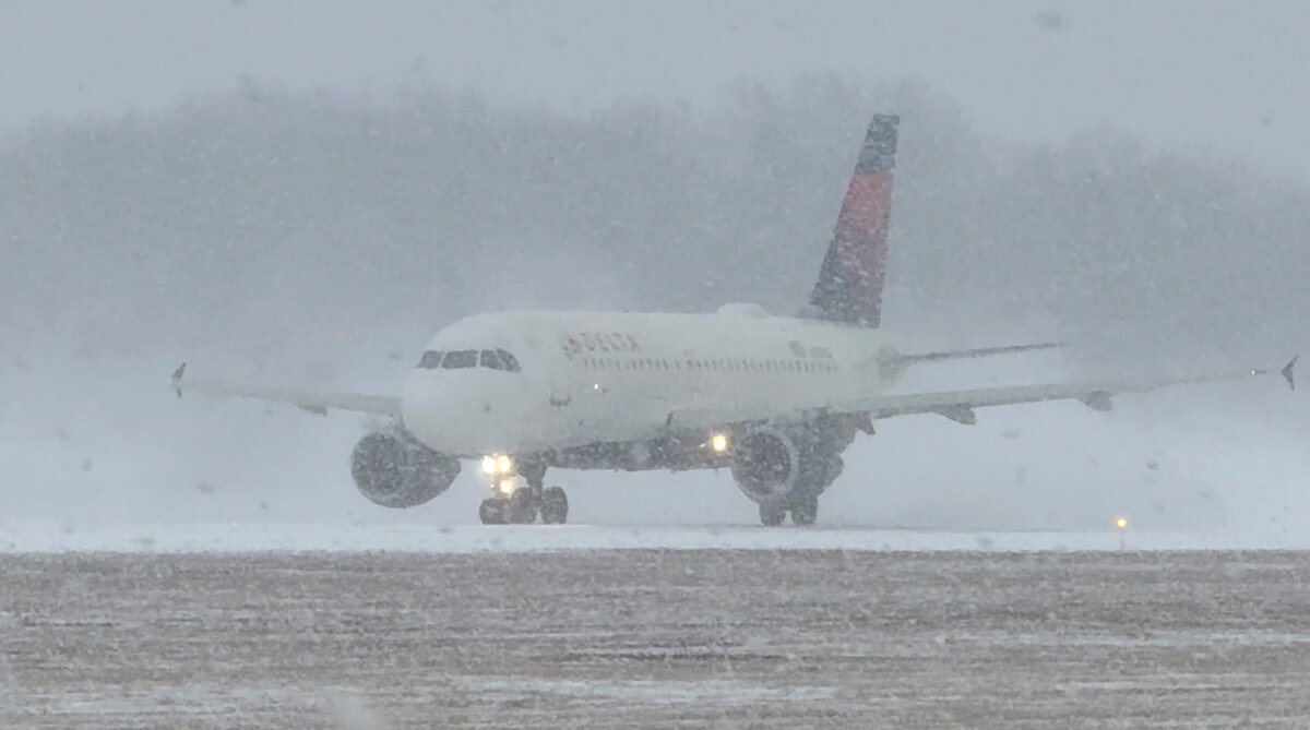 A Delta Air Lines plane prepares to take off during a winter storm at Greater Rochester International Airport in Rochester, N.Y., on Dec. 26, 2025, in this screengrab obtained from a social media video. (Joseph Frascati via Reuters)
