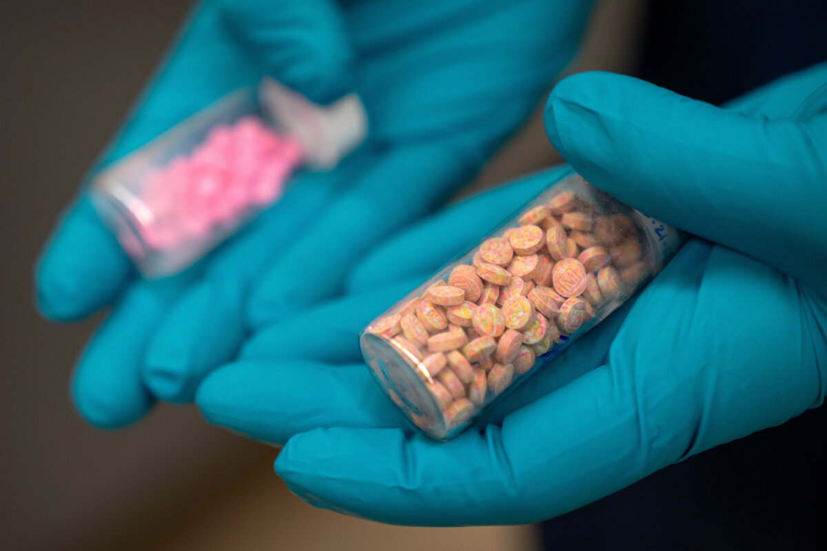President Donald Trump signs an executive order classifying fentanyl as a "weapon of mass destruction," during a ceremony for the presentation of the Mexican Border Defense Medal in the Oval Office of the White House on Dec. 15, 2025. (Anna Moneymaker/Getty Images)