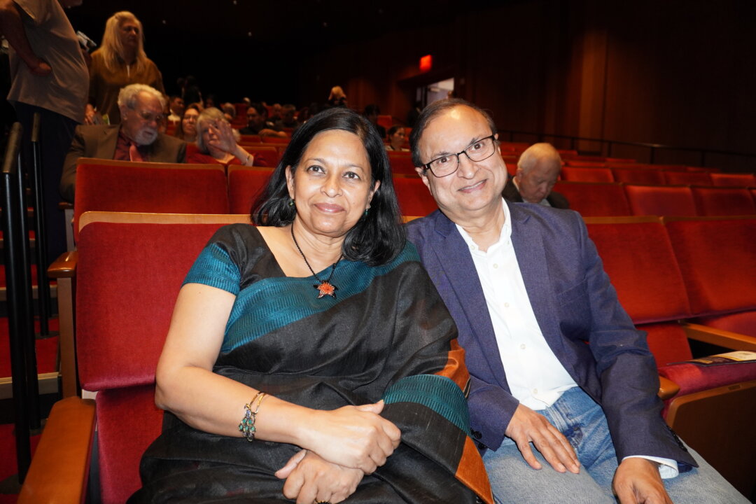 (L-R) Nivedita Ganguly and Sid Ganguly watch Shen Yun at the Jones Hall for the Performing Arts in Houston, Texas, on Dec. 28, 2025. (Sherry Dong/The Epoch Times)