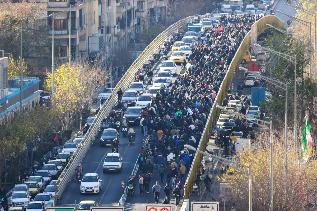 Protesters march in downtown Tehran, Iran, on Dec. 29, 2025. (Fars News Agency via AP)