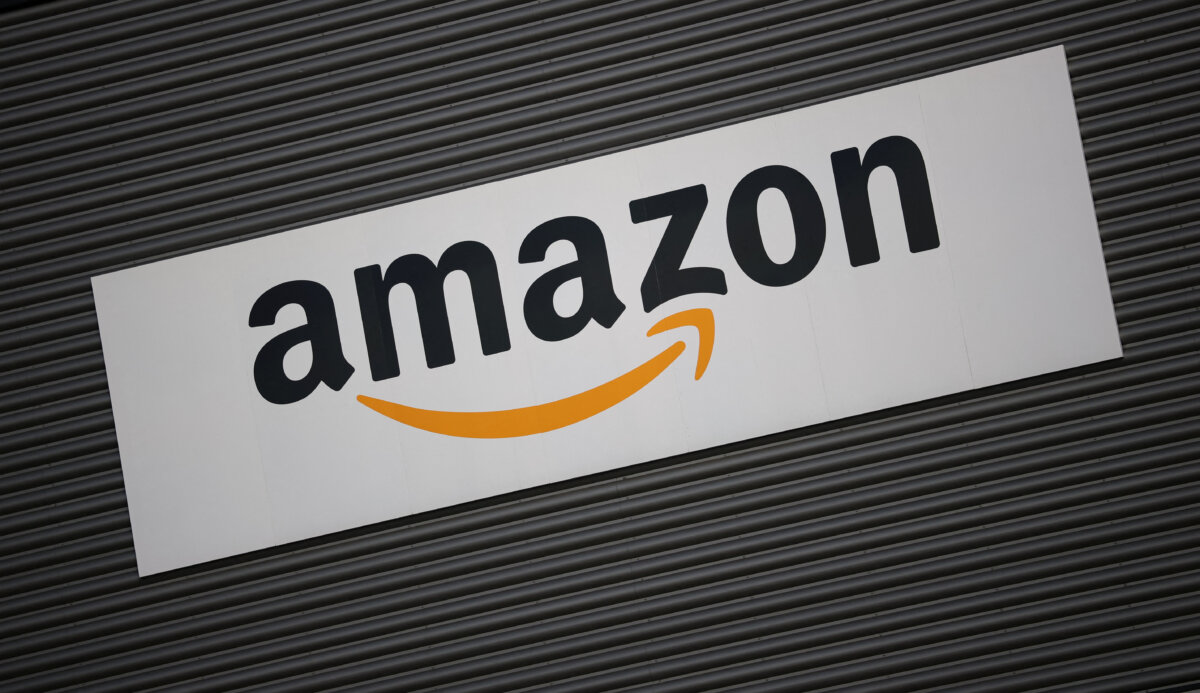Amazon’s logo outside an Amazon warehouse in Manchester, England, on Oct. 28, 2025. (REUTERS/Phil Noble)