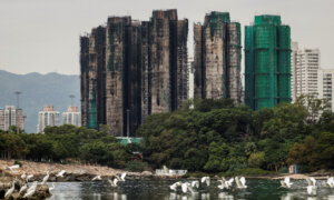 Hong Kong Arrests 21 in Renovation Graft Crackdown