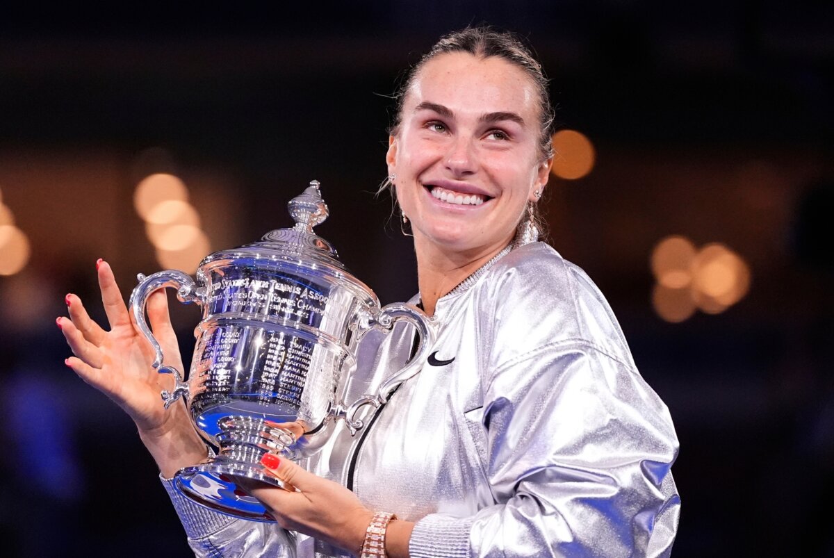 Aryna Sabalenka, of Belarus, holds her trophy aftyer defeating Amanda Anisimova, of the United States, after the women's finals of the U.S. Open tennis championships, on Sept. 6, 2025, in New York. (Yuki Iwamura/AP Photo)