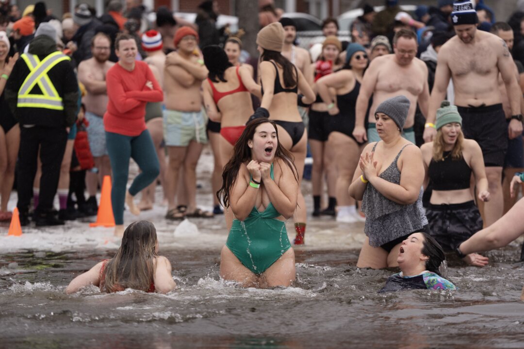 Many Mark the New Year With ‘Exhilarating’ Polar Dip in Icy Water
