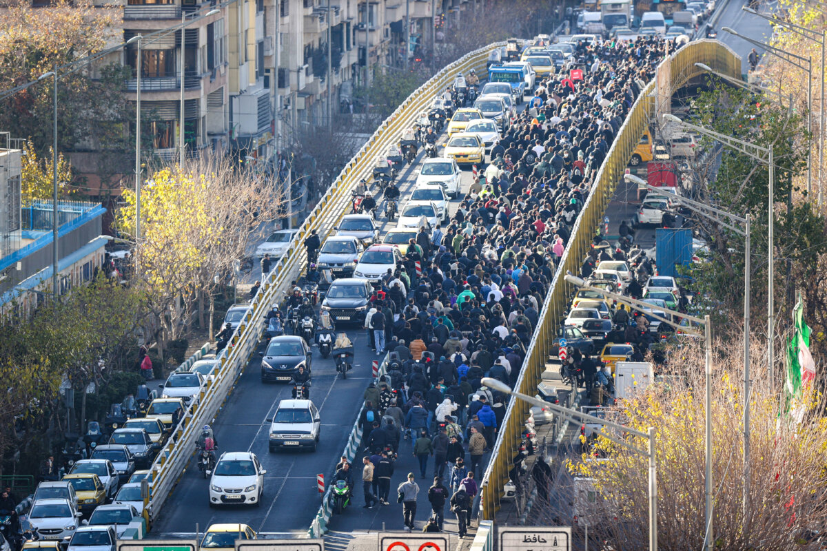 Protesters march in downtown Tehran, Iran, on Dec. 29, 2025. (Fars News Agency via AP)