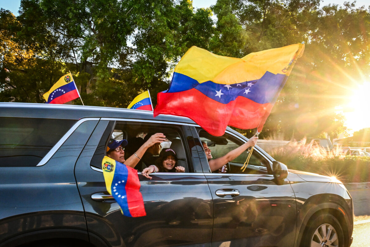 People celebrate the news of the capture of Venezuelan leader Nicolás Maduro after U.S. military actions in Venezuela in Doral, Fla., on Jan. 3, 2026. (Giorgio Viera/AFP via Getty Images)