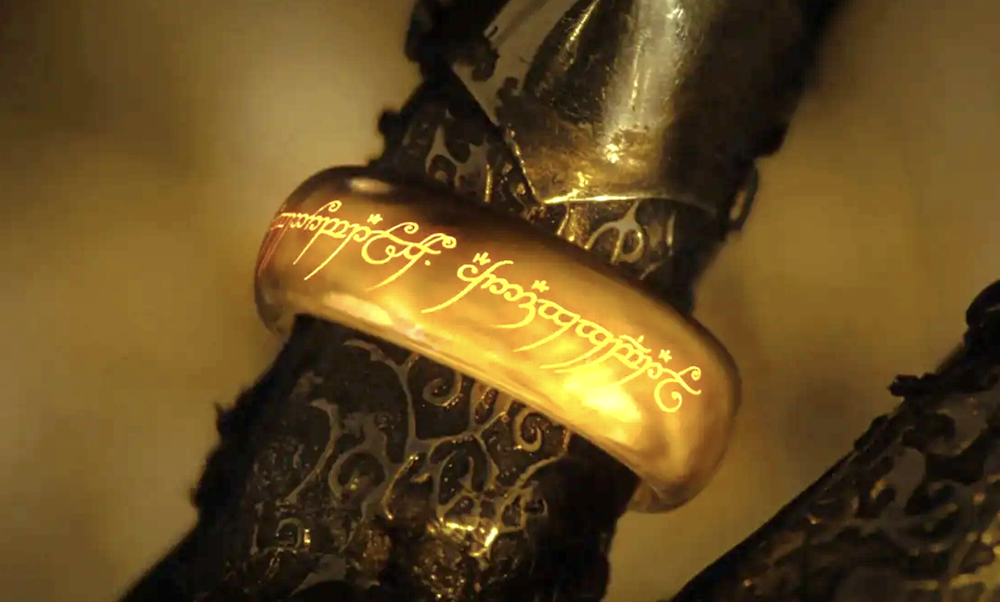 gold ring on an armored finger in The Lord of the Rings: The Fellowship of the Ring