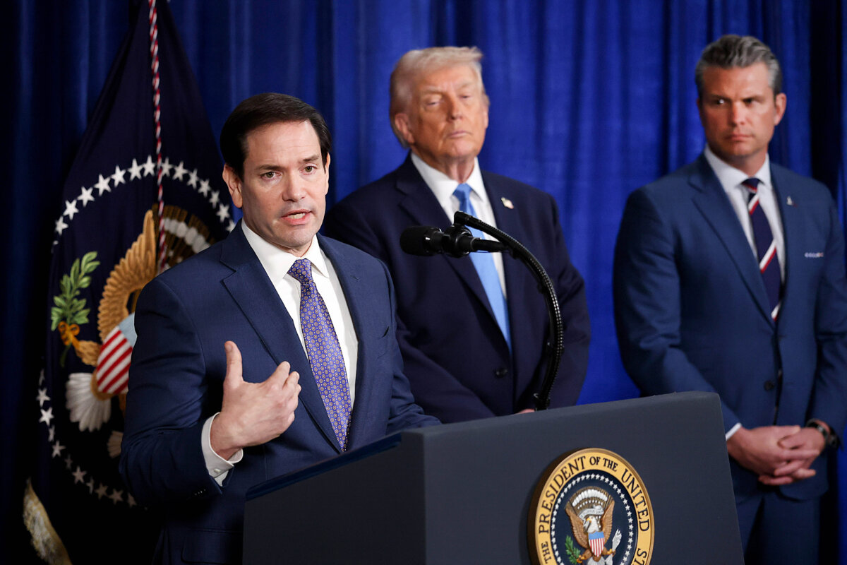 U.S. Secretary of State Marco Rubio speaks during a press conference as President Donald Trump and Defense Secretary Pete Hegseth listen at the Mar-a-Lago Club in Palm Beach, Fla., on Jan. 3, 2026. (Joe Raedle/Getty Images)