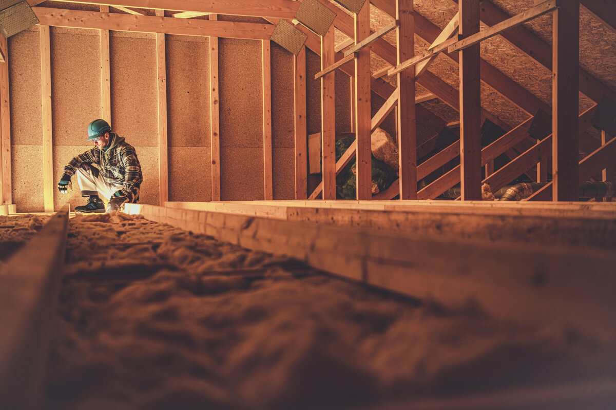 Fiberglass batt insulation should be fitted snugly without gaps to achieve optimal efficiency. (welcomia/Getty Images)