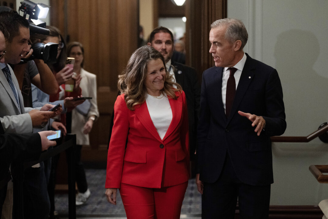 Carney Says He’s ‘Absolutely Not’ Keeping Freeland as MP Due to Minority Government