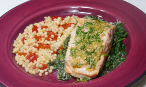 Garlic and Herb Salmon on Creamy Spinach With Pimento Couscous