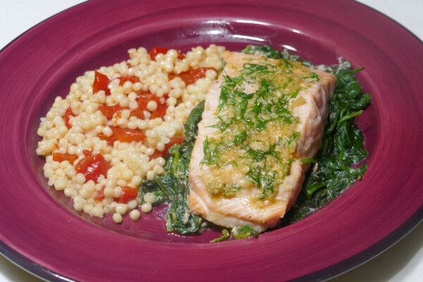 Garlic and Herb Salmon on Creamy Spinach With Pimento Couscous