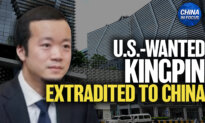 China Holds US-Wanted Scam Kingpin
