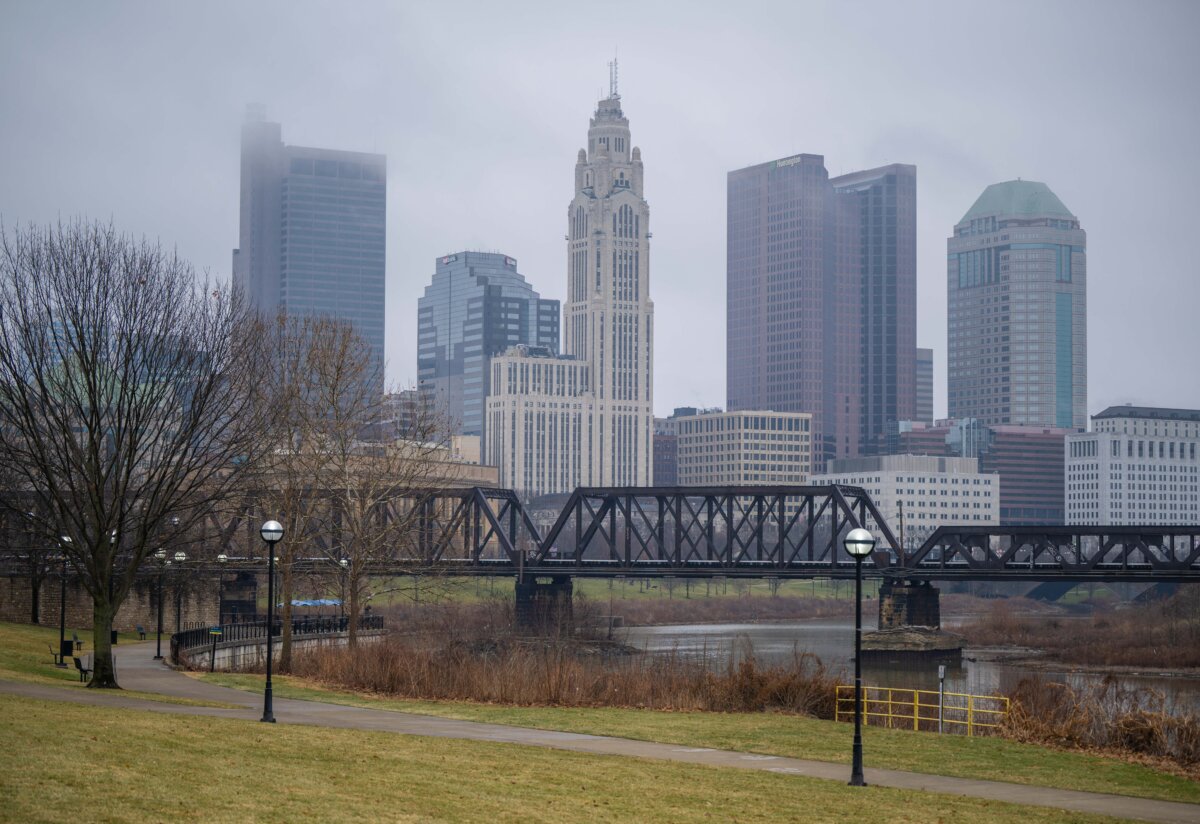A view of the Columbus, Ohio skyline looking across the Scioto River from North Bank Park, on Jan. 6, 2026. (Glenn Hartong for The Epoch Times)