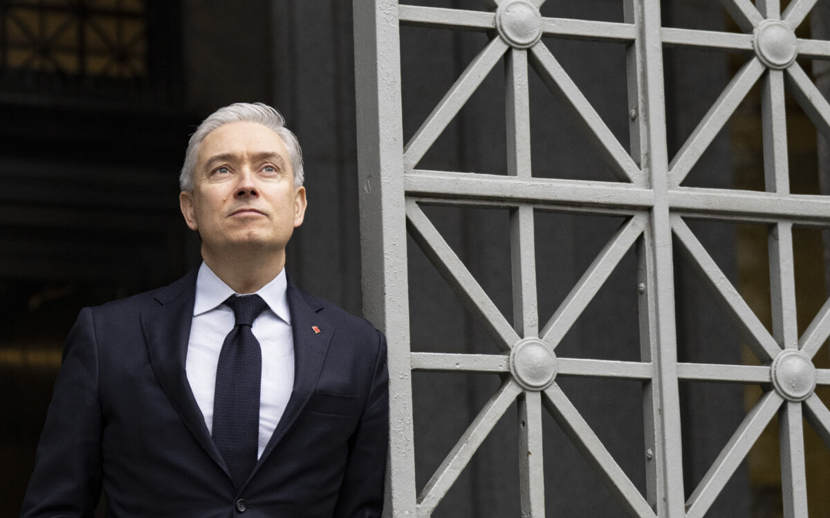 Minister of Finance Francois-Philippe Champagne poses outside the ministry's offices, in Montreal, on Dec. 19, 2025. (The Canadian Press/Christinne Muschi)