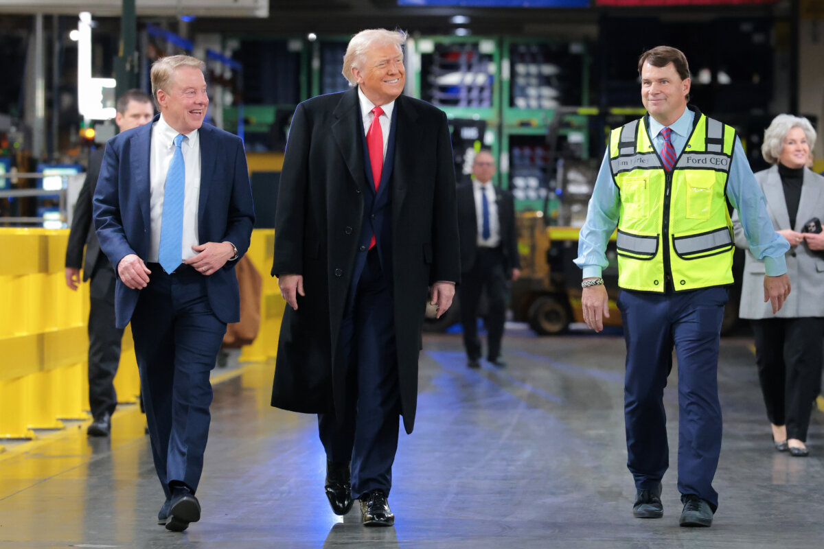 President Donald Trump walks with executive chair of Ford Motor Co. Bill Ford Jr. (L) and CEO of Ford Motor Co. Jim Farley as they tour the Ford River Rouge complex in Dearborn, Mich., on Jan. 13, 2026. (Anna Moneymaker/Getty Images)