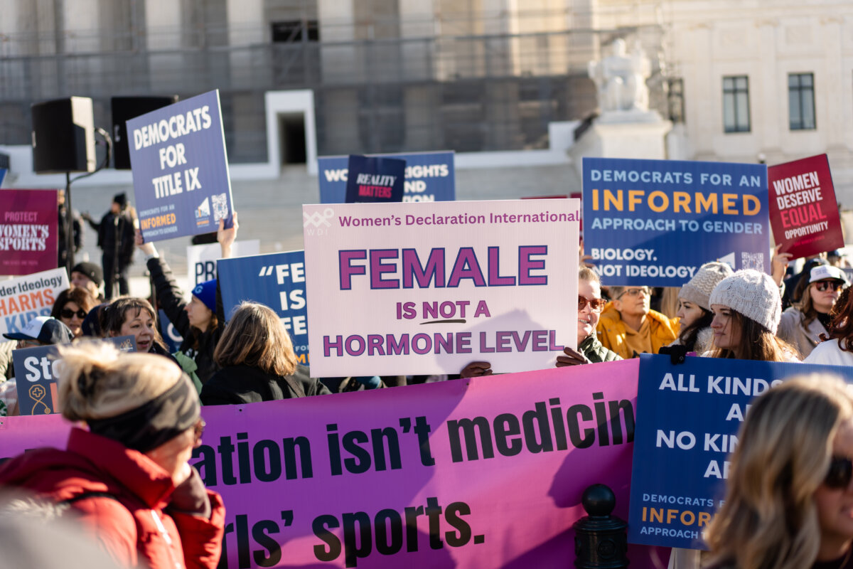 People take part in a rally outside the U.S. Supreme Court as justices hear arguments in two cases in which states have banned males from participating in female sports, in Washington on Jan. 13, 2025. (Madalina Kilroy/The Epoch Times)