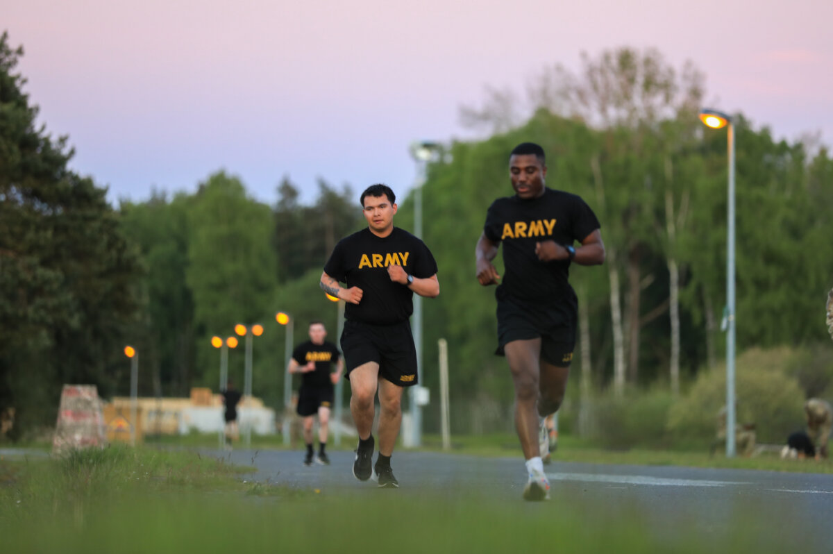 U.S. Army soldiers conduct the two-mile run portion of the Army Combat Fitness Test during a fitness competition at Grafenwoehr Training Area, Bavaria, Germany, on May 11, 2025. (Spc. Sar Paw/U.S. Army via DVIDS)