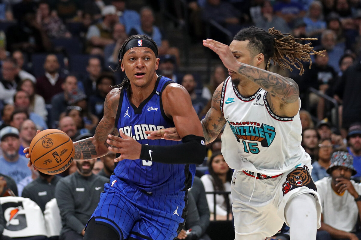 Paolo Banchero #5 of the Orlando Magic drives to the basket against Brandon Clarke #15 of the Memphis Grizzlies during the first half at FedExForum in Memphis, Tenn., on Oct. 26, 2024. (Justin Ford/Getty Images)