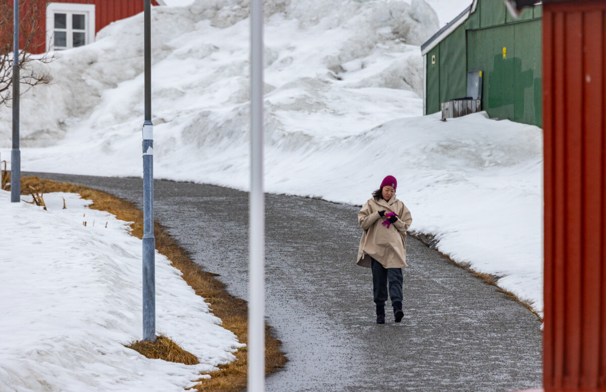 A woman walks in Nuuk, Greenland, on May 4, 2025. (John Fredricks/The Epoch Times)