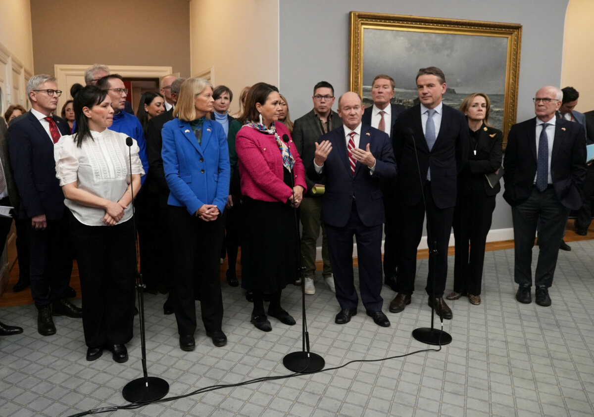 U.S. Senator Chris Coons (D-Del.) talks to journalists after members of the Danish Parliament and a Greenlandic committee met with American Congress members at the Danish Parliament, in Copenhagen, Denmark, Jan. 16, 2026. (Tom Little / Reuters)