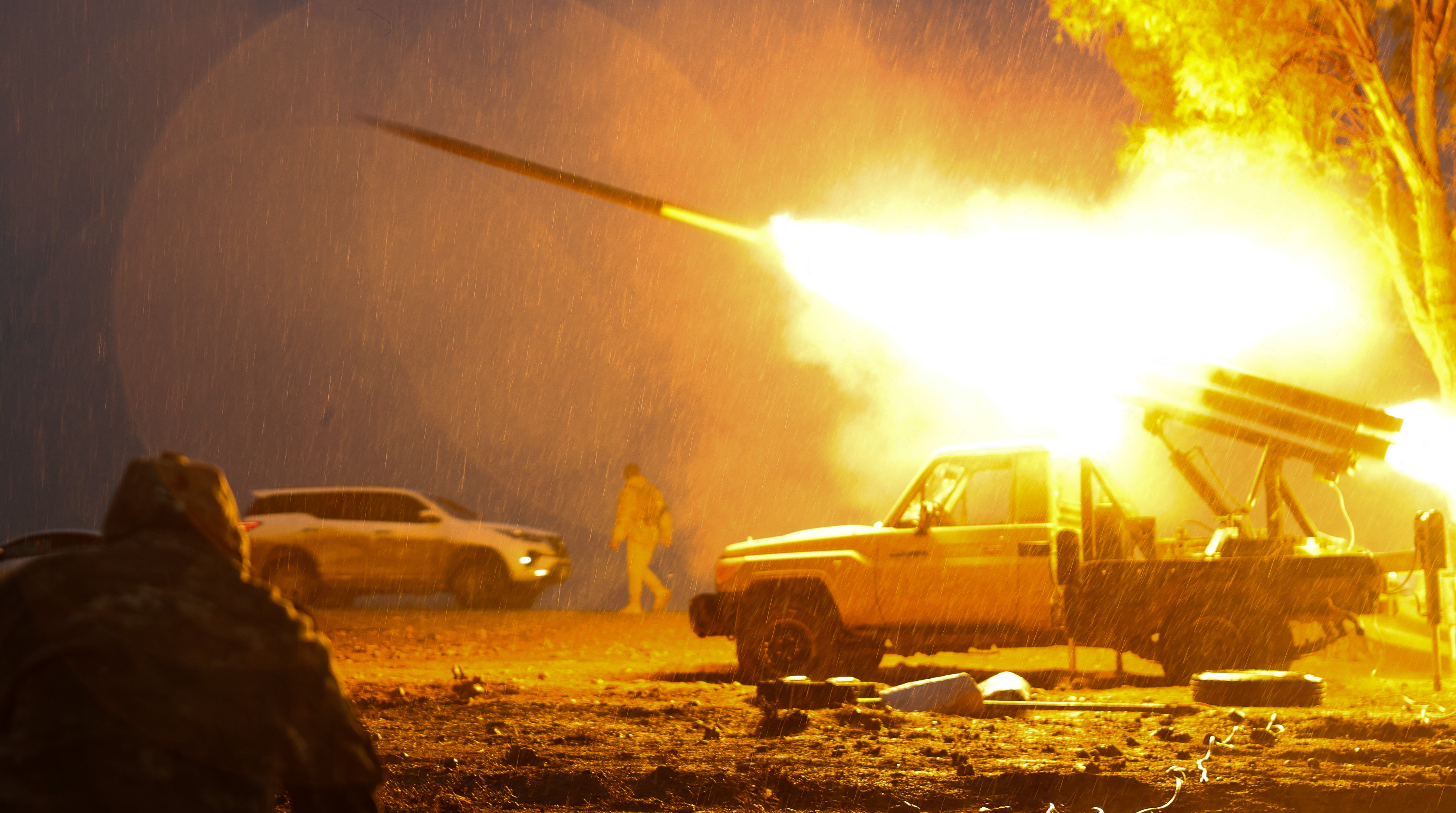 Day in Photos: Offensive in Syria, Rocket For New Lunar Mission, and Greyhounds Race