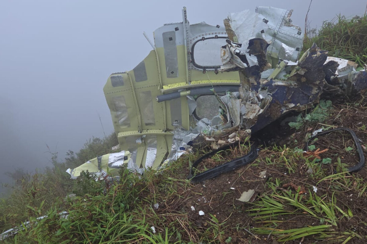 Debris of an ATR 42-500 turboprop airplane at Mount Bulusaraung in South Sulawesi province, Indonesia, on Jan. 18, 2026, after the aircraft lost contact Saturday. (BASARNAS via AP)
