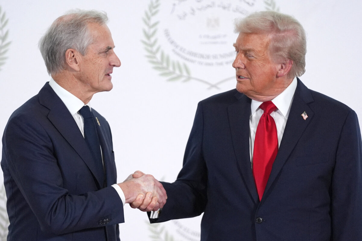 U.S. President Donald Trump greets Norway's prime minister, Jonas Gahr Store (L), during a summit on Gaza in Sharm el-Sheikh, Egypt, on Oct. 13, 2025. (Evan Vucci/Pool/AFP via Getty Images)